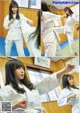 A woman in a white kimono is practicing karate. 