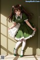 A girl in a green dress and white tights leaning against a wall.